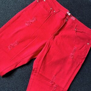 Red ripped skinny jeans
